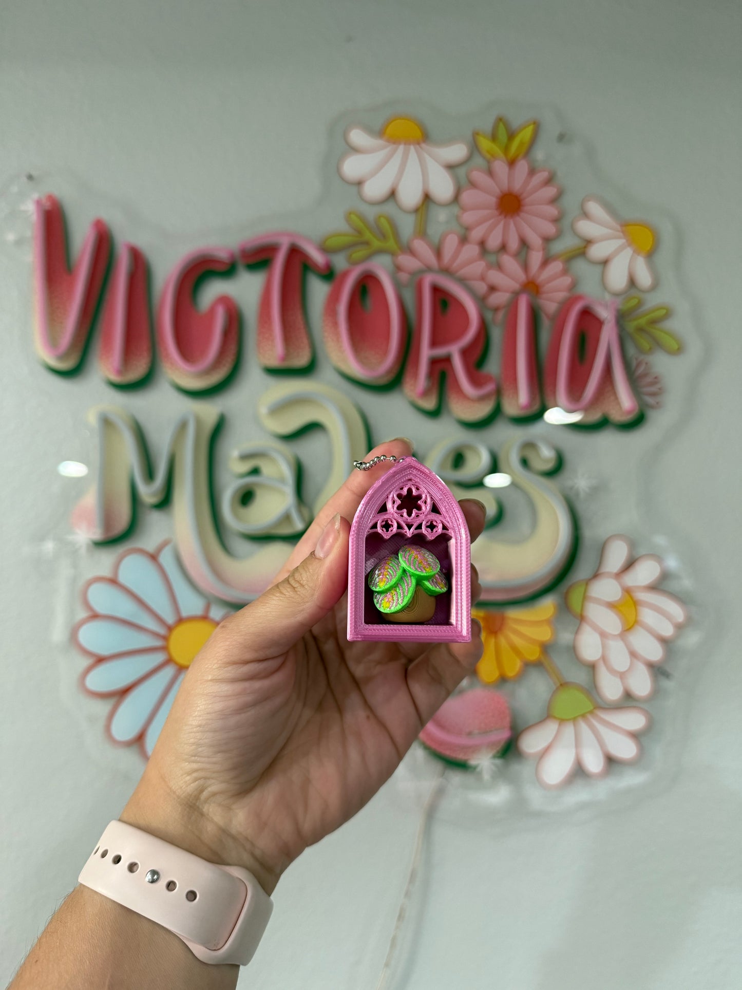 Pink gothic frame clicker plant