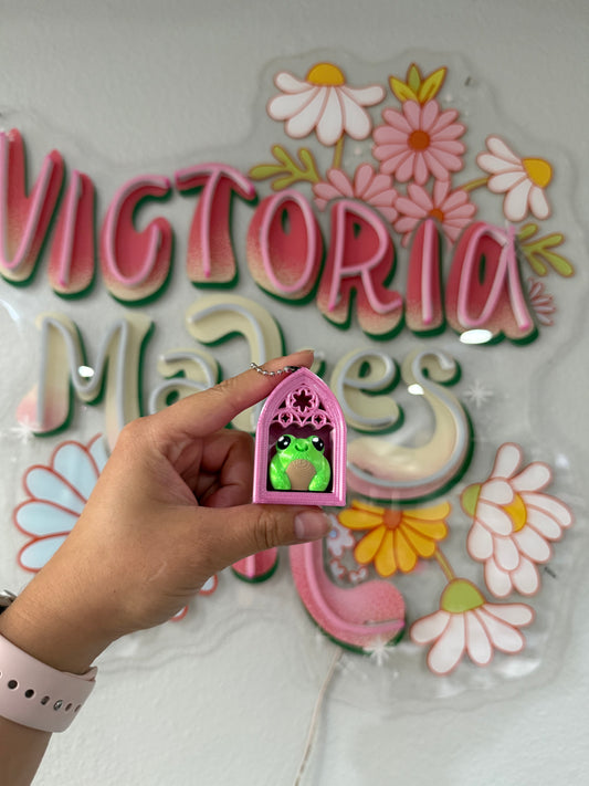 Pink gothic frame clicker frog