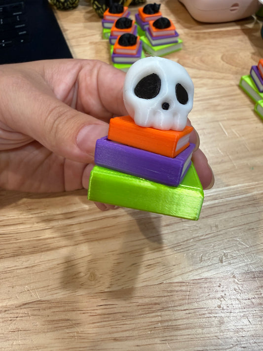 Skull book stack clicker