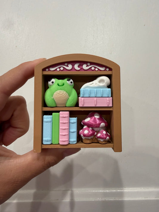 Small bookshelf clicker